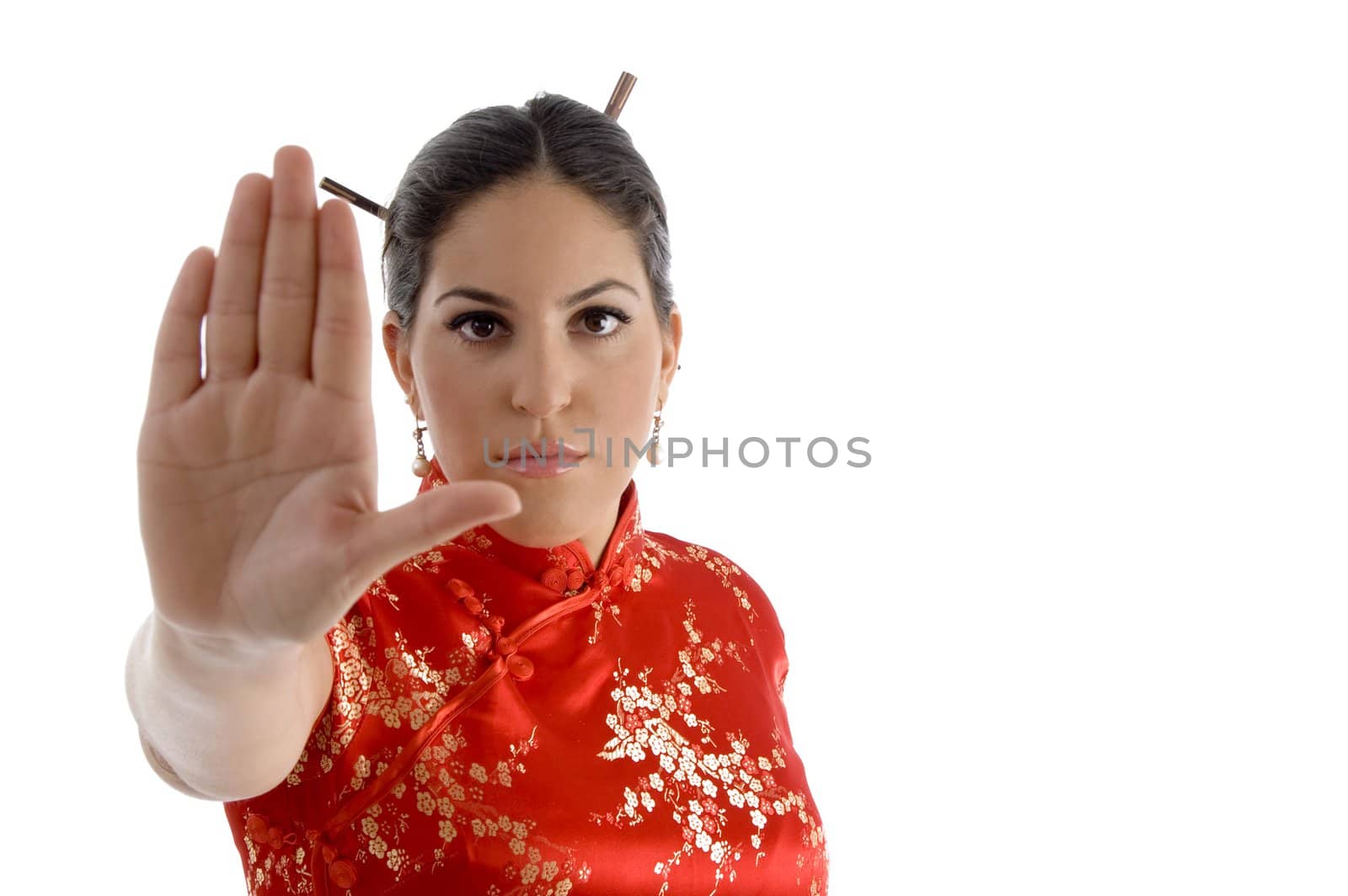 female showing stopping hand gesture on an isolated background