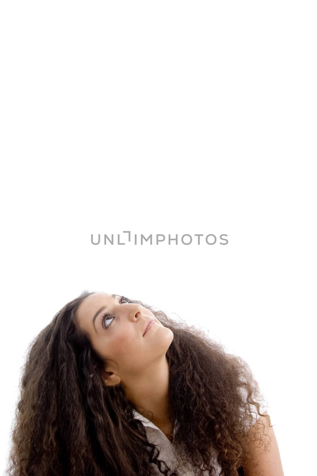 attractive woman looking upwards on an isolated background