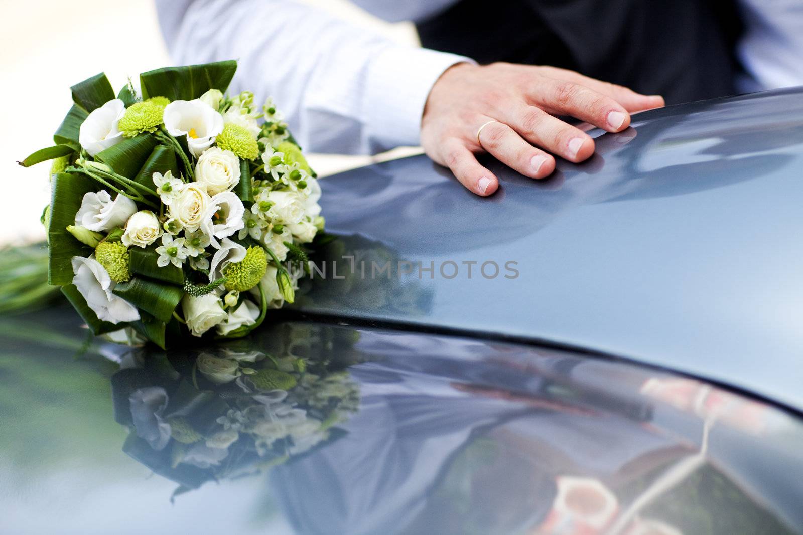 wedding bouquet on the car