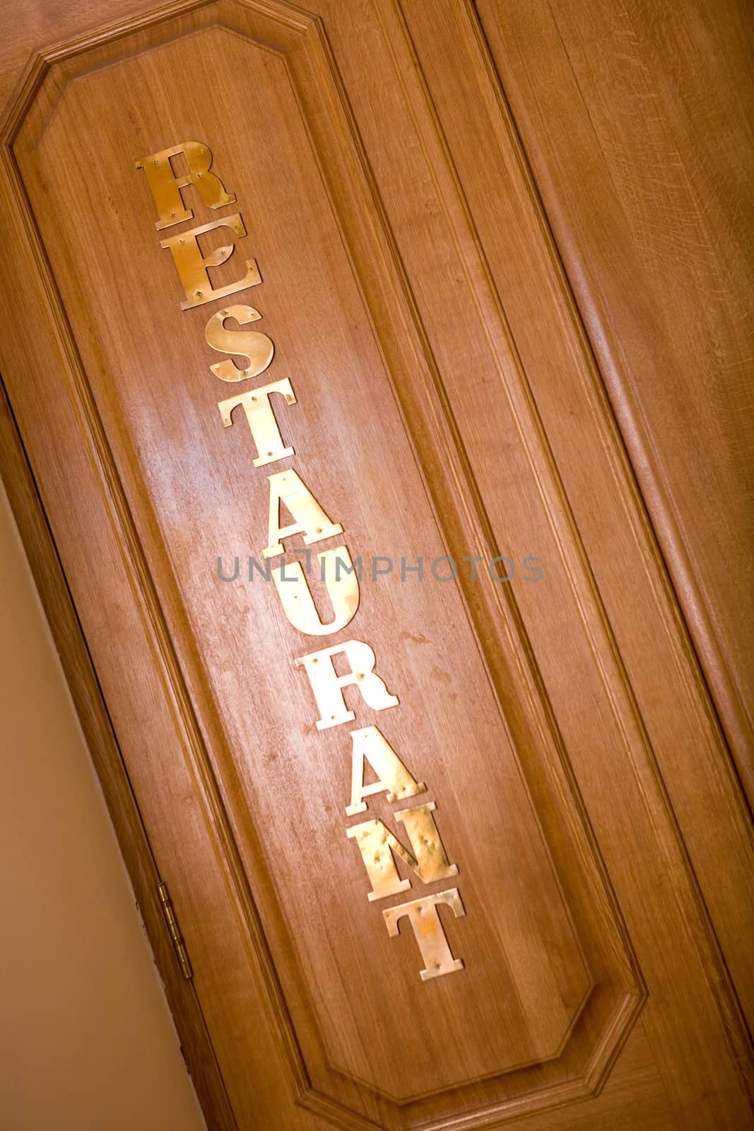 inscription restaurant on the wooden panel