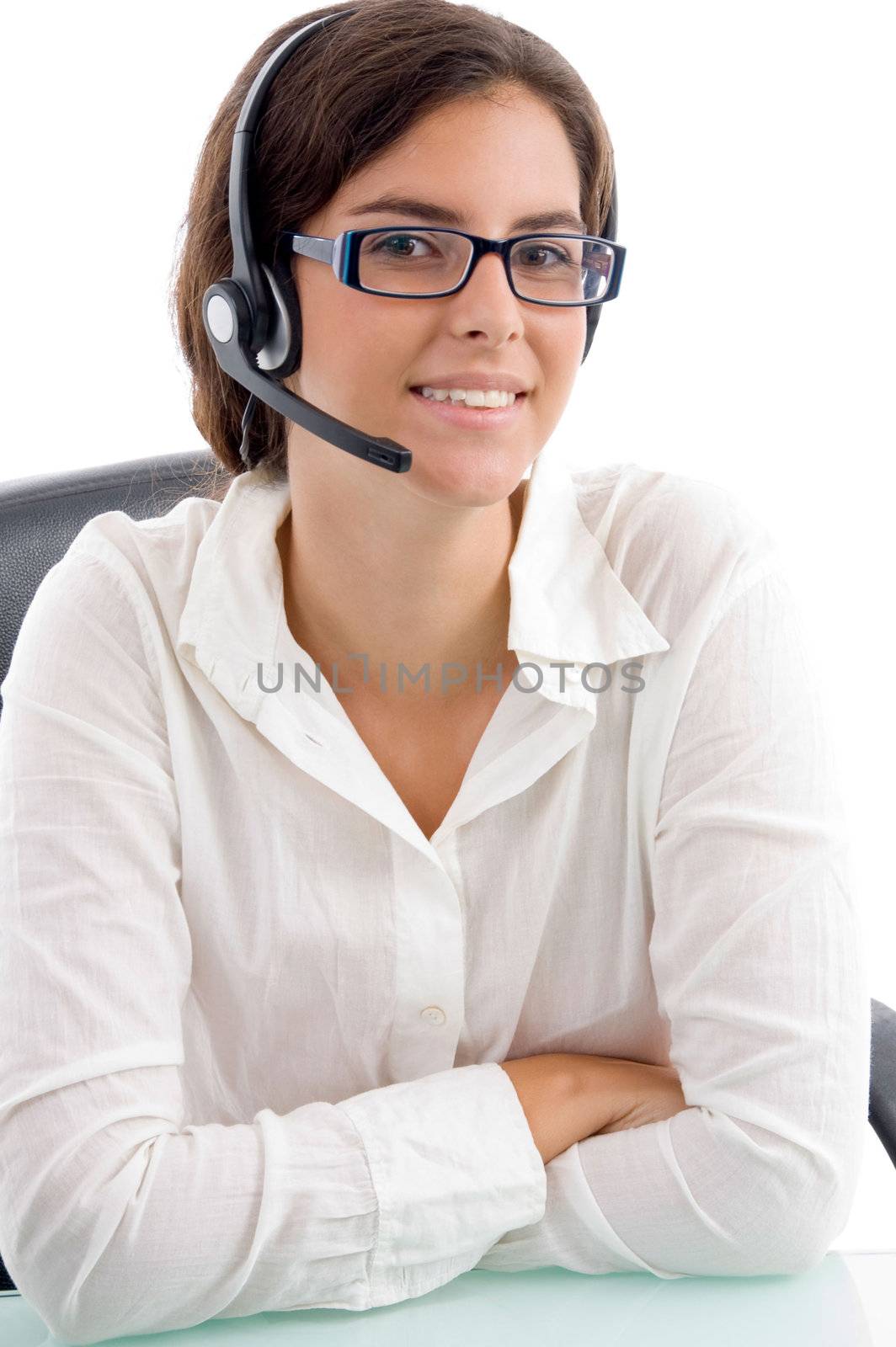 woman with headset and folded hands on an isolated white background