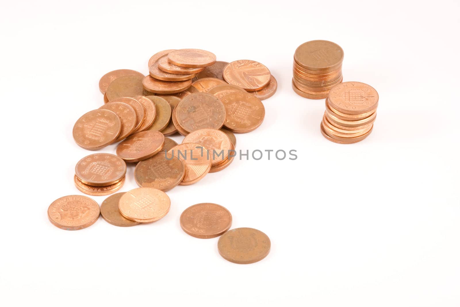 Pile of pennies and stacks of pennies.