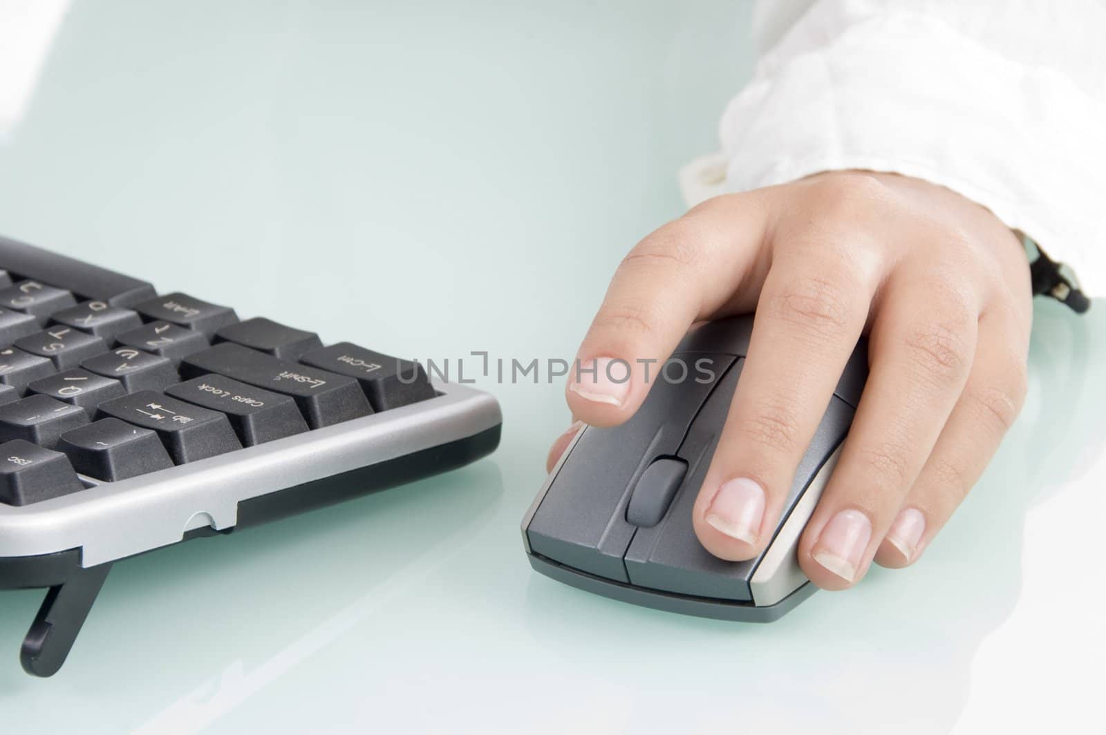 mouse in woman's hand on an isolated background