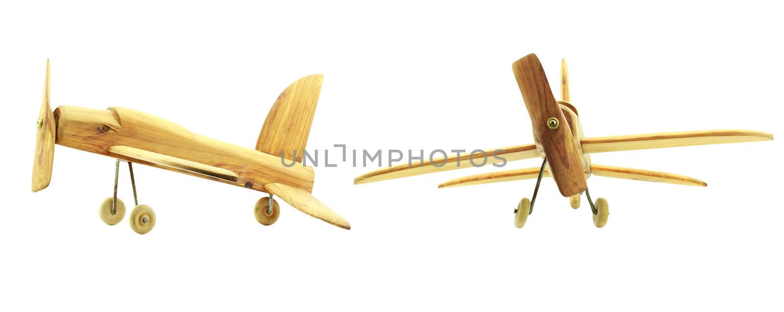 Wooden toy airplanes isolated on a white background. Clipping path included.