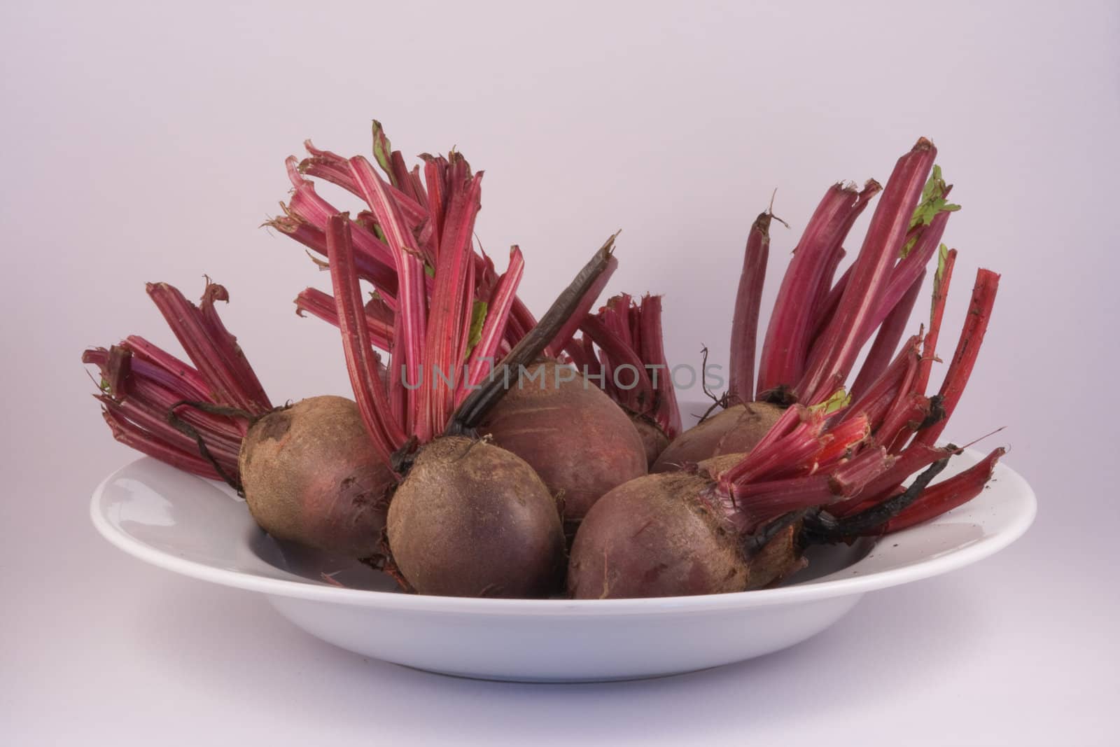 Plate of beetroot on white. by richsouthwales