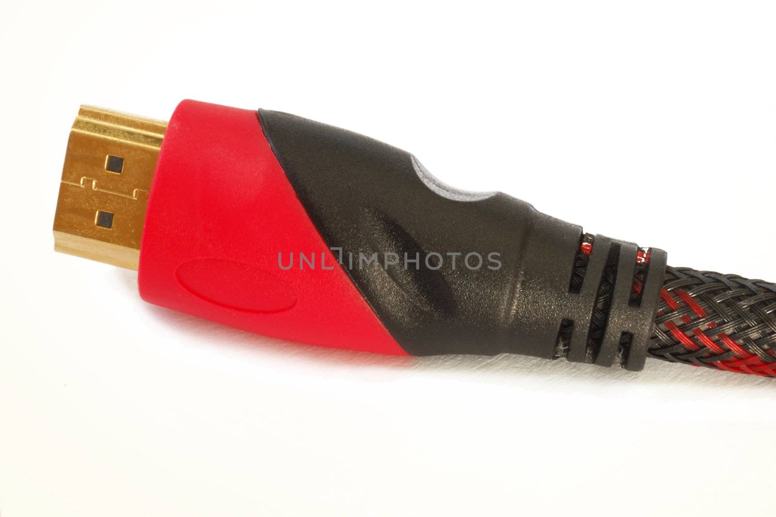 Detail of a red/black HDMI Cable connector isolated