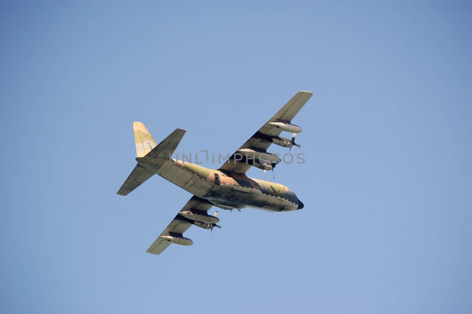Military plane flying by nihues