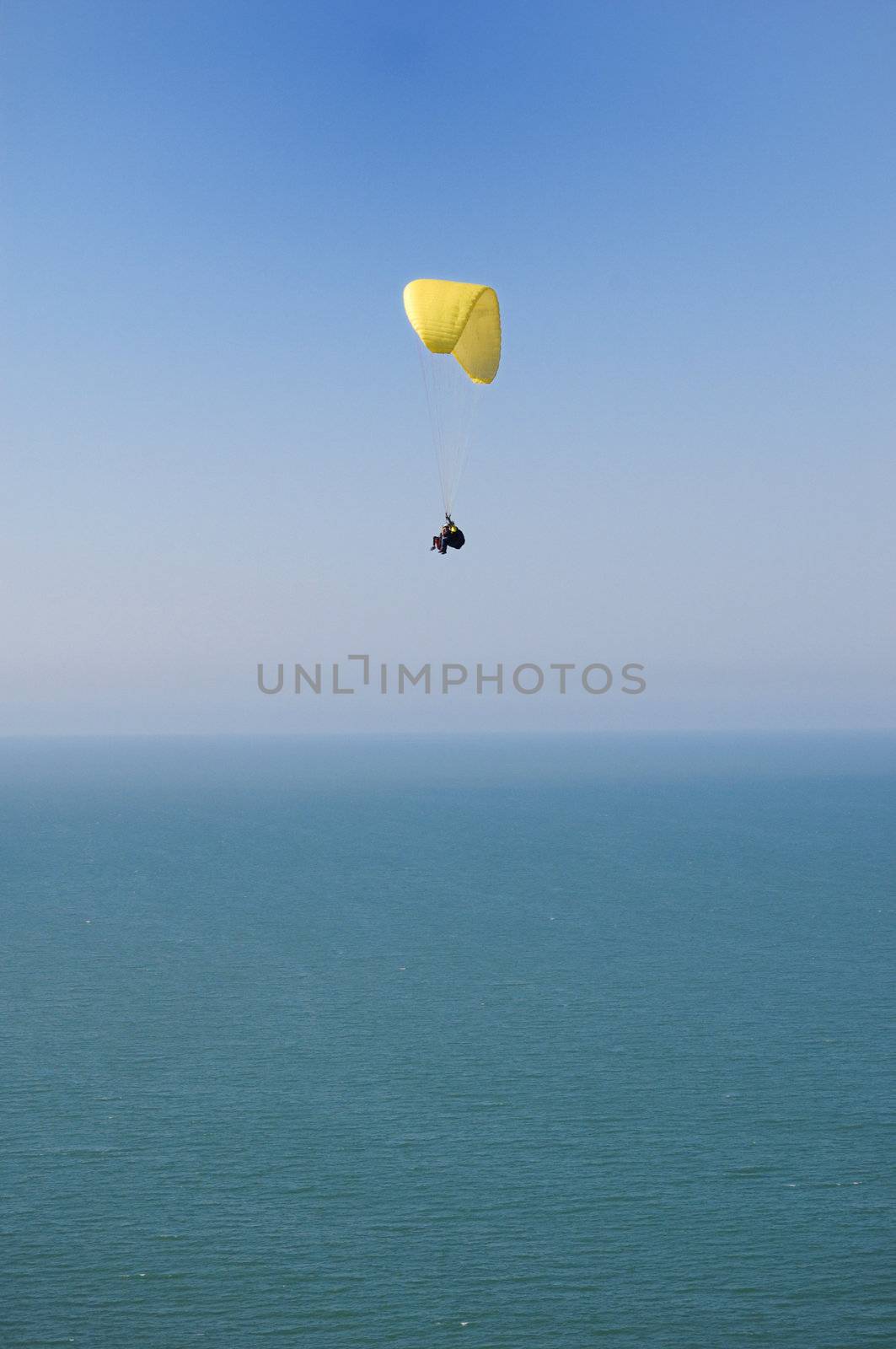 Double Paragliding above ocean by nihues
