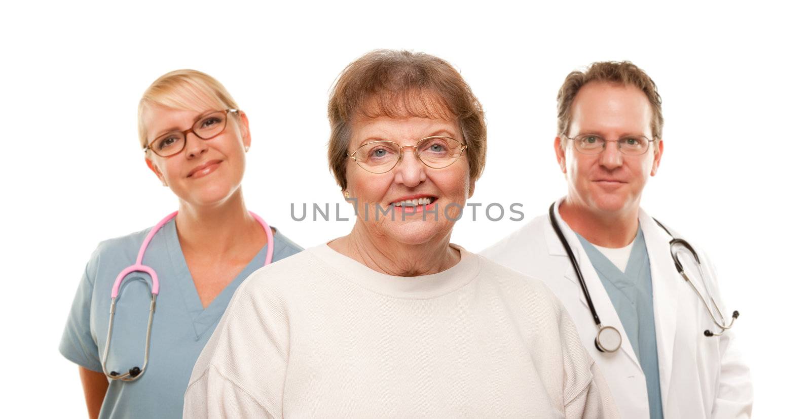 Smiling Senior Woman with Medical Doctor and Nurse Behind Isolated on a White Background.