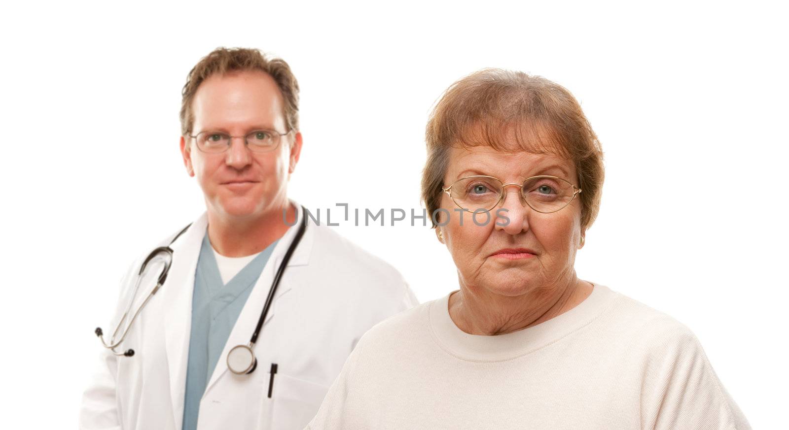 Concerned Senior Woman with Male Doctor Behind Isolated on a White Background.