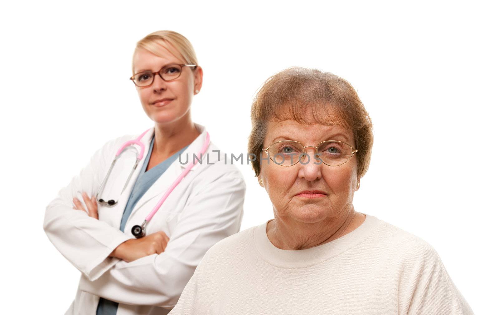 Concerned Senior Woman with Doctor Behind
 by Feverpitched