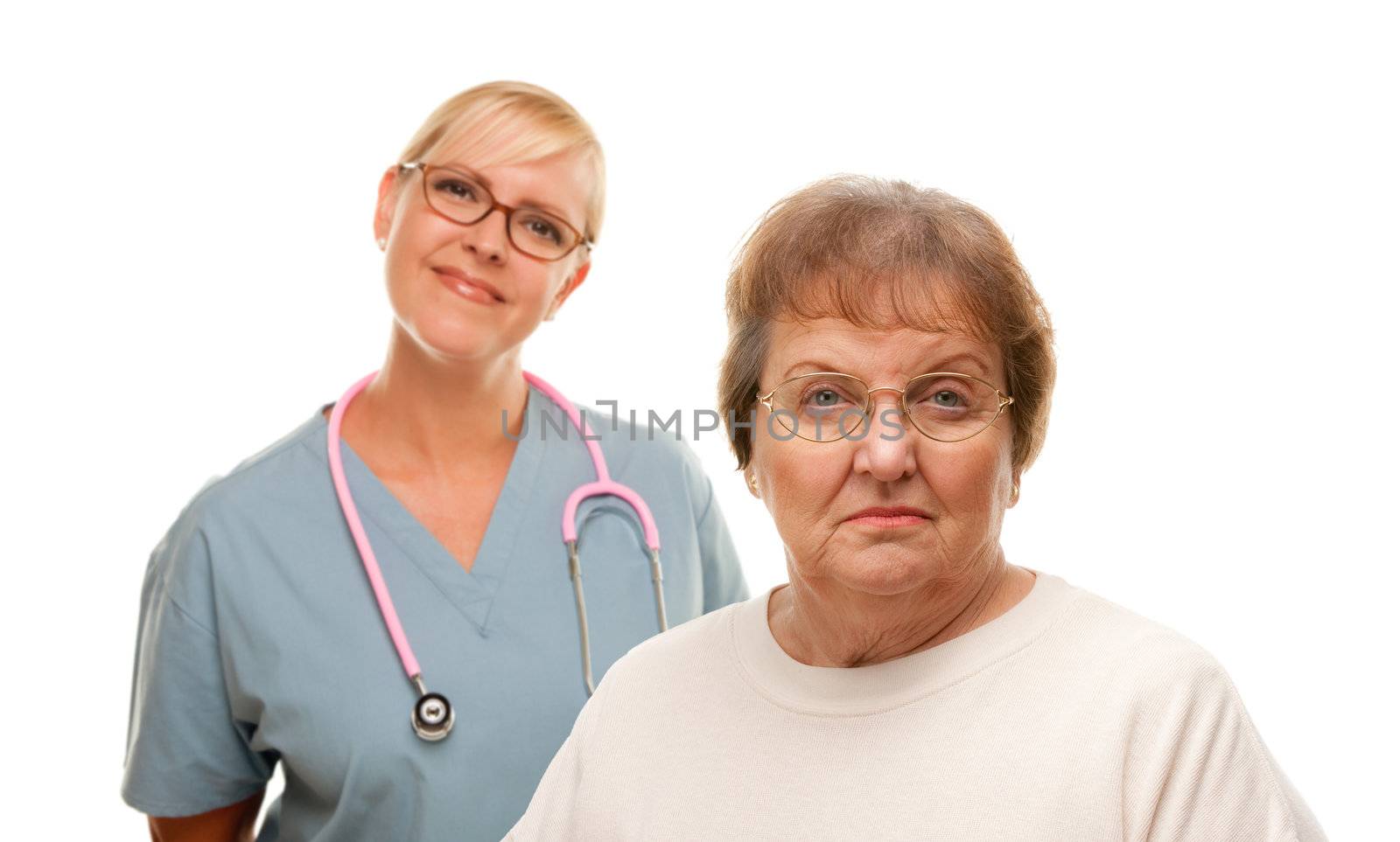 Concerned Senior Woman with Female Doctor Behind Isolated on a White Background.