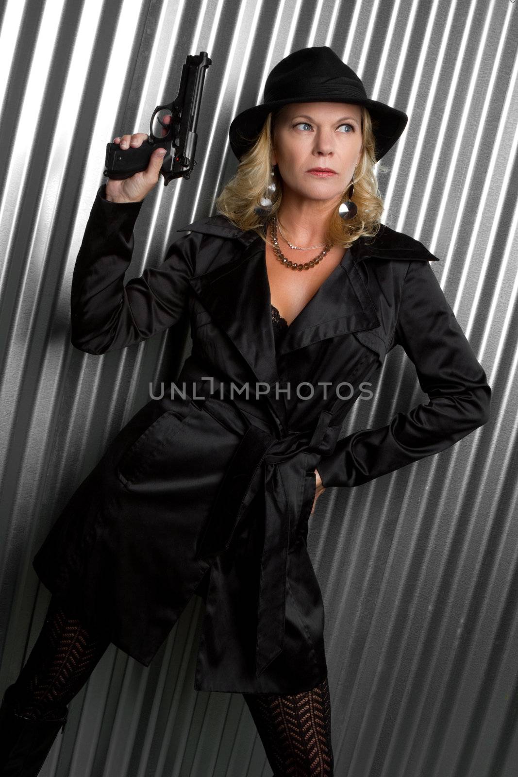 Detective woman holding gun