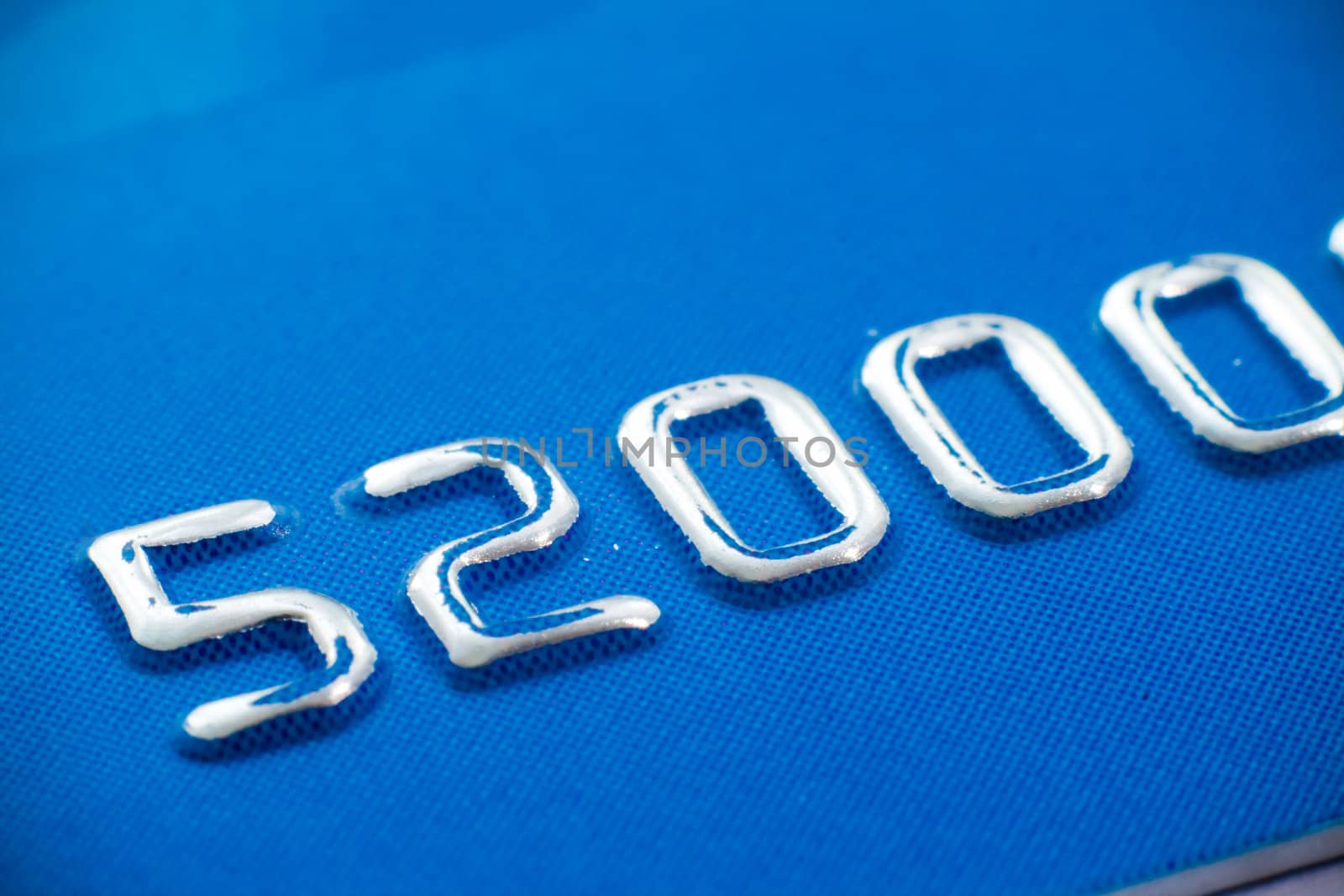 Macro close-up of plastic credit card
