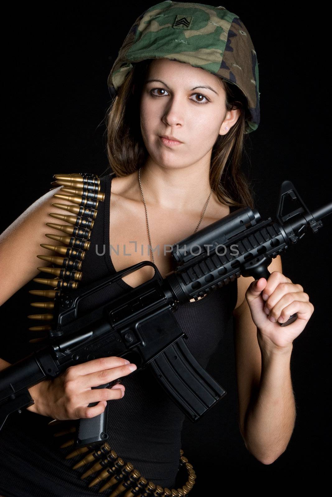 Army girl holding machine gun