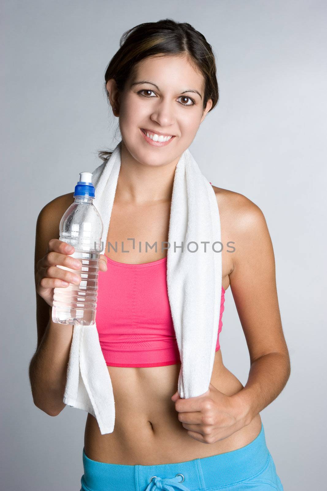 Fitness woman holding water bottle