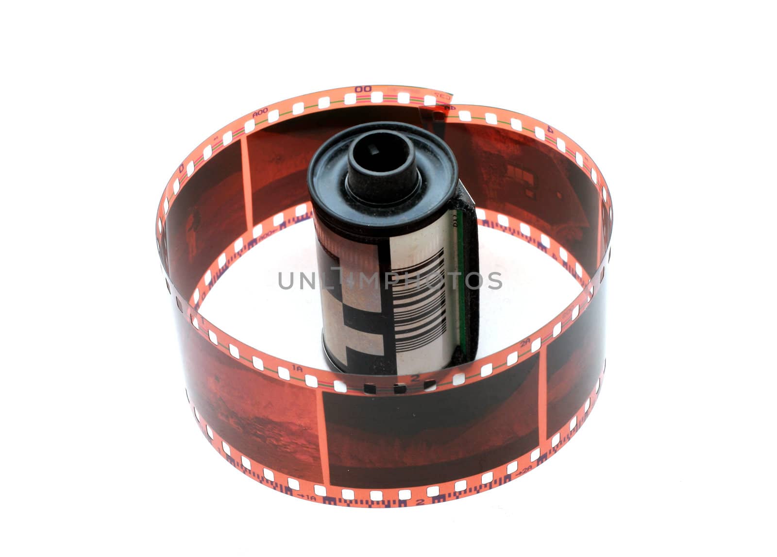 35 mm negative film and roll isolated in white background