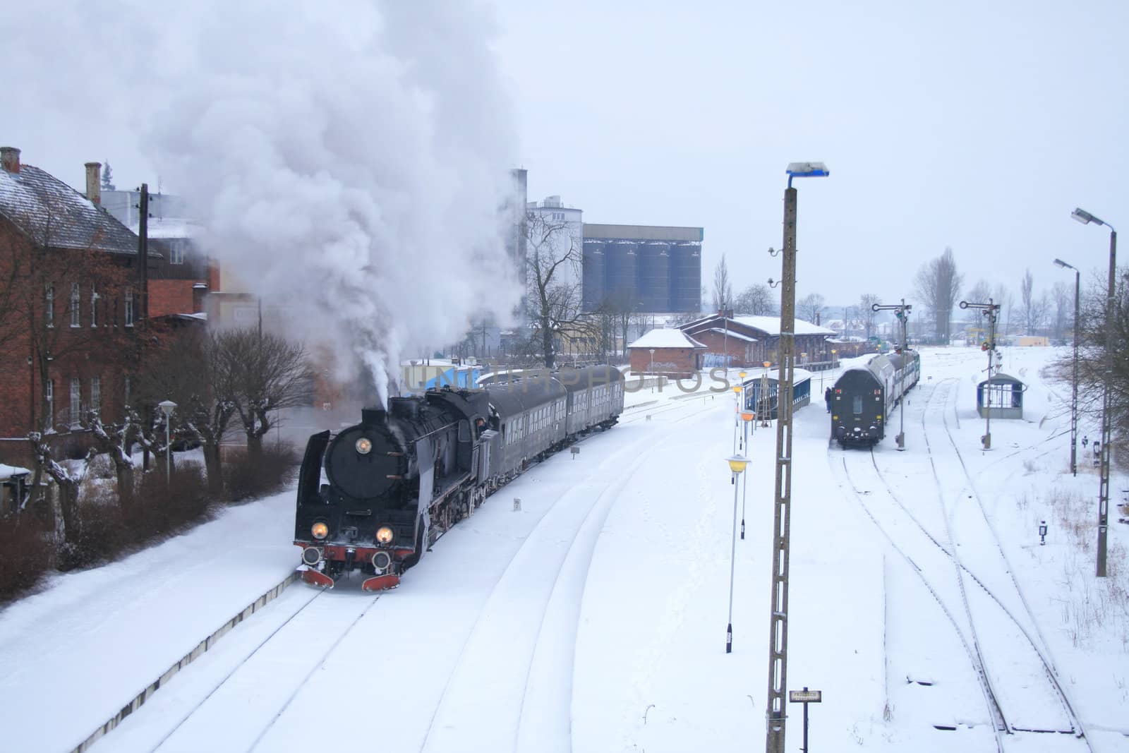 Old retro steam train stopped at the station