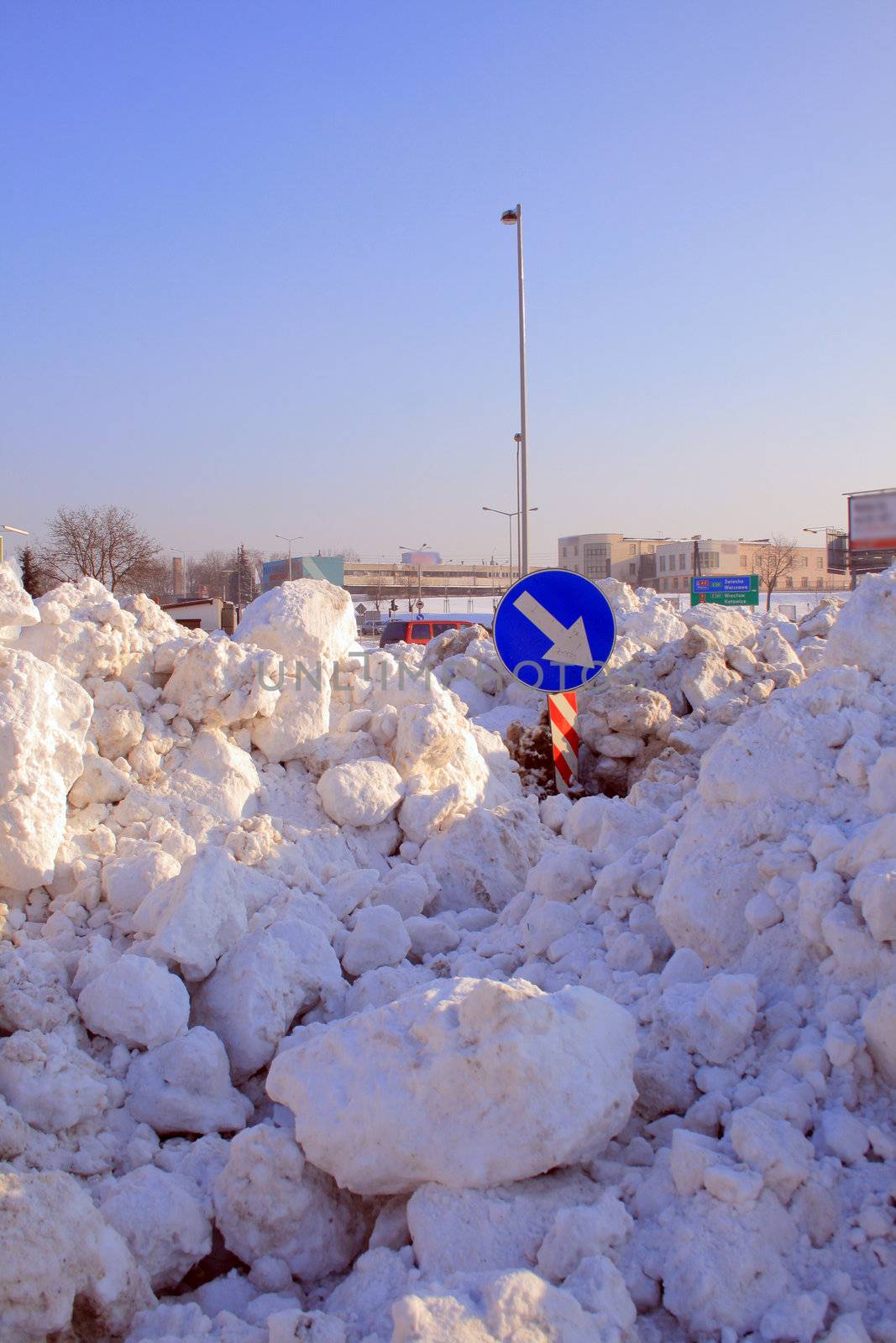 Heap of crushed snow collected from the town center