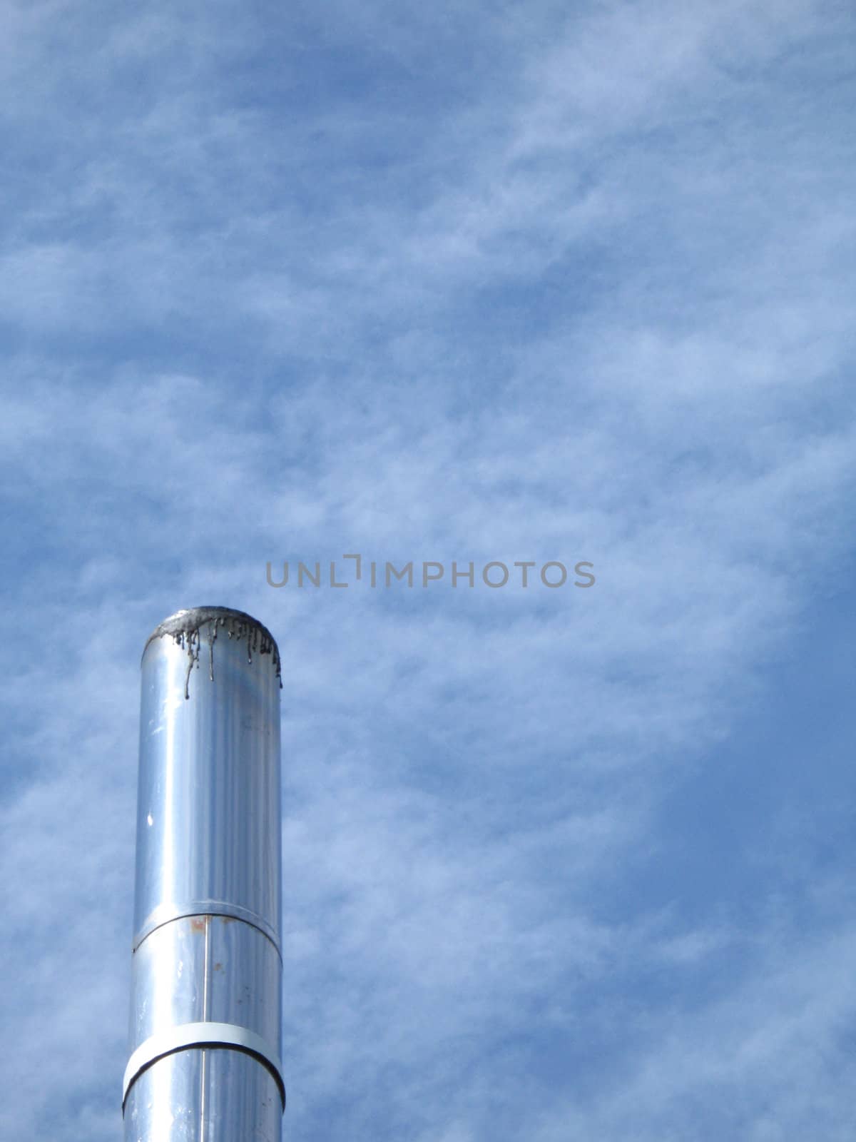 silver chimney in the blue sky