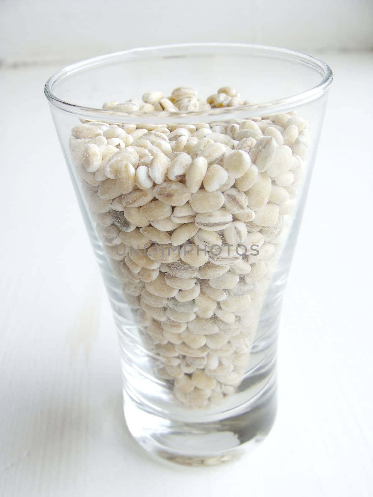 Pearl barley in a glass close up 