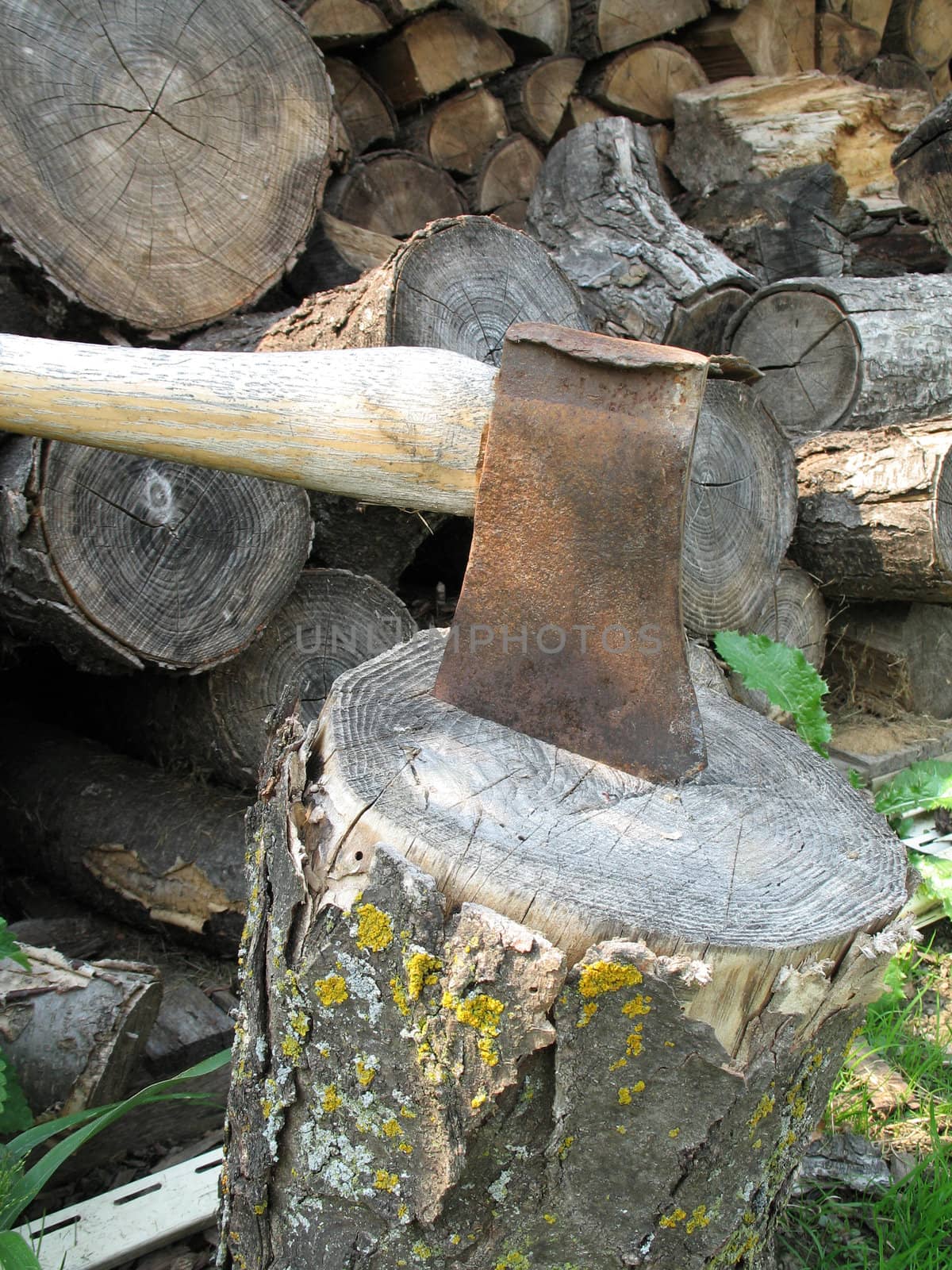 axe on a piece of wood