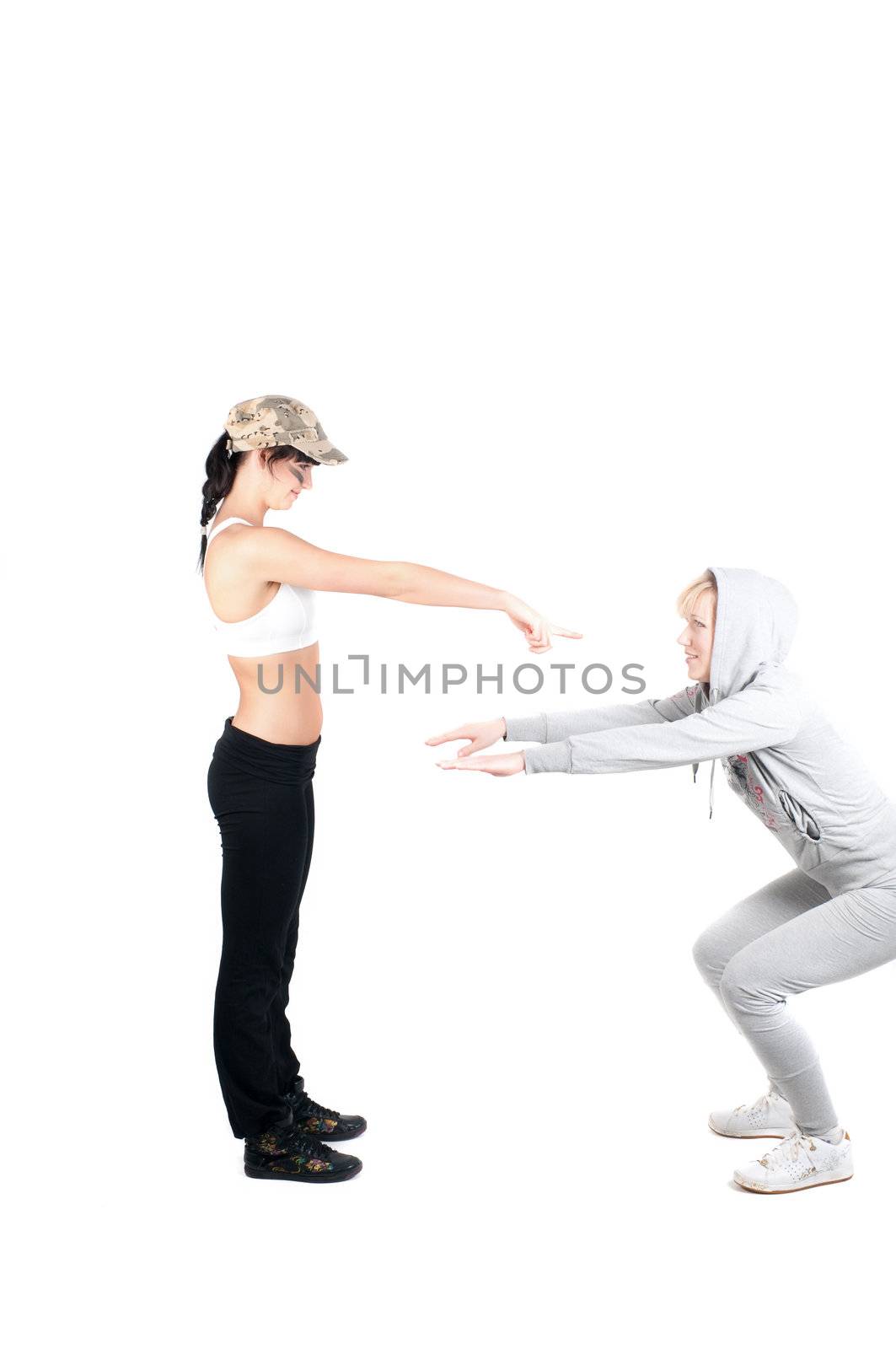 Shoot of two fitness instructors isolated on white