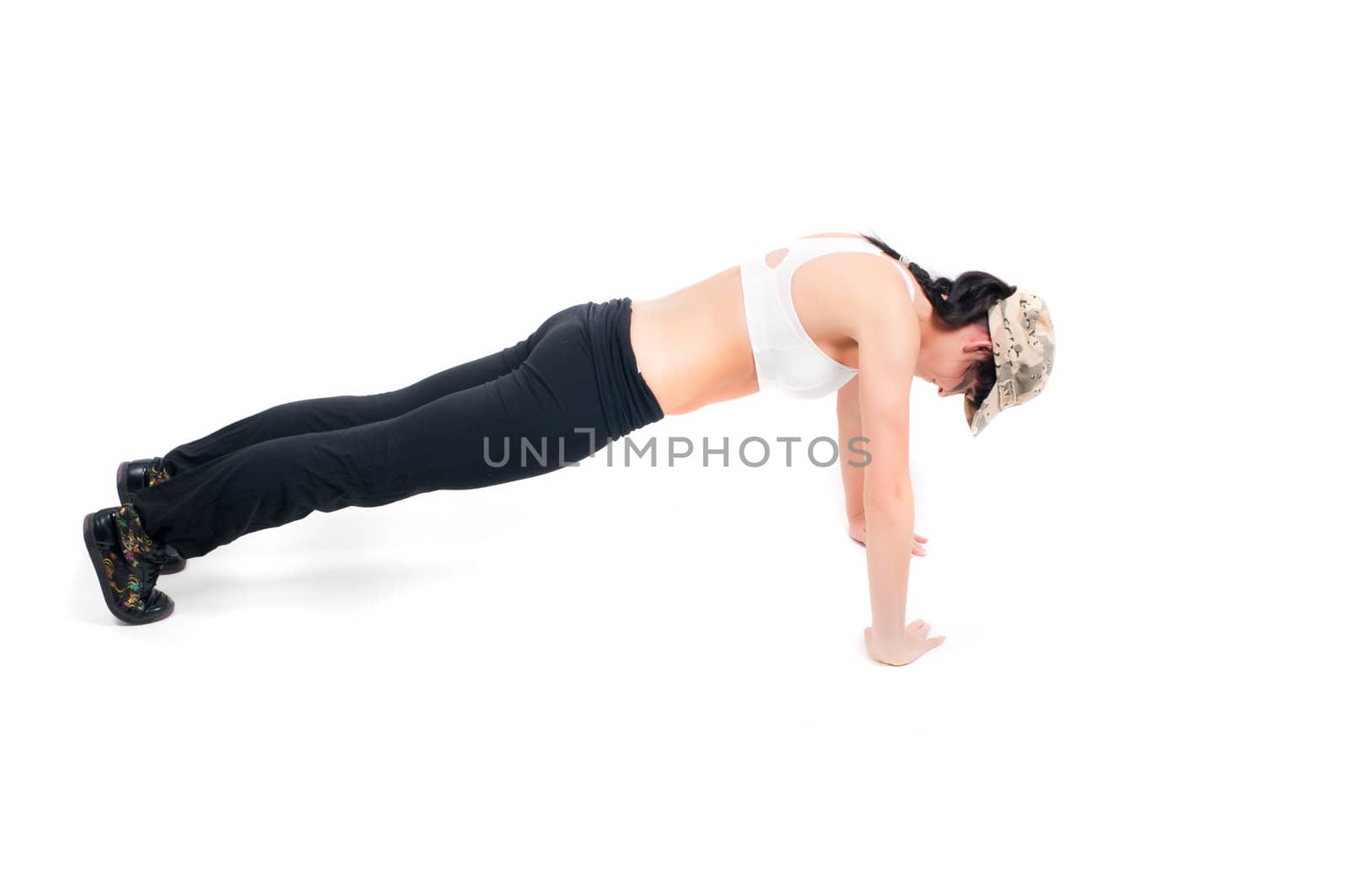 Shoot of fitness instructor in military style isolated on white