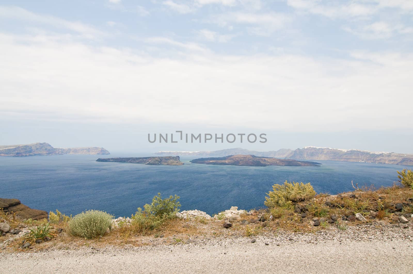 Beautiful view on Santorini volcano, blue see and sky