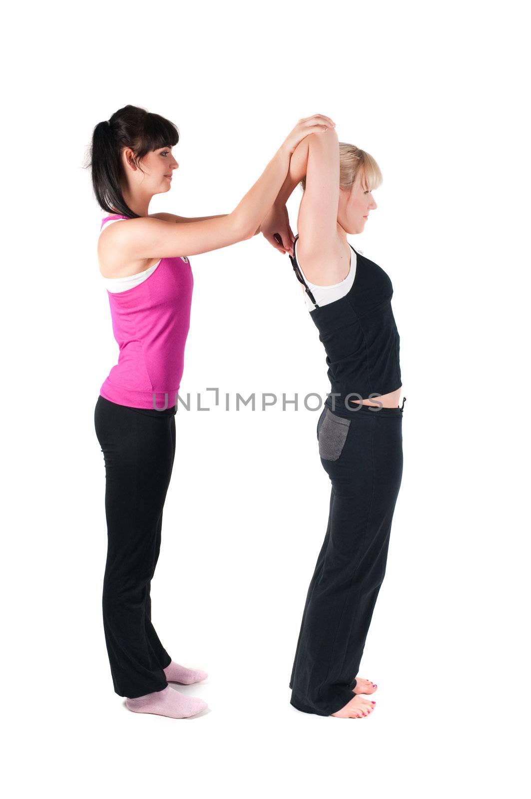 Shoot of two fitness instructors isolated on white