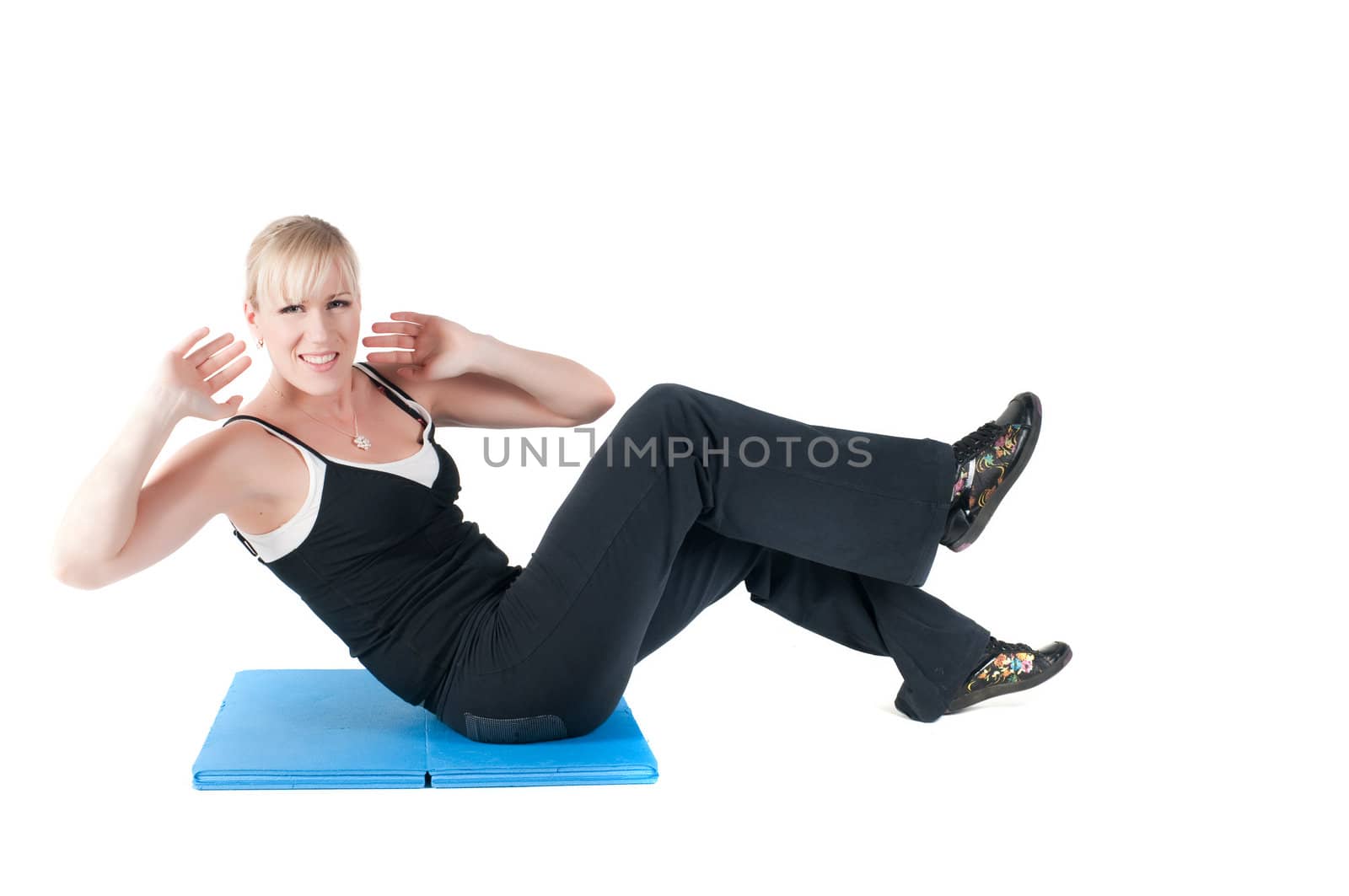 Shoot of fitness instructor isolated on white