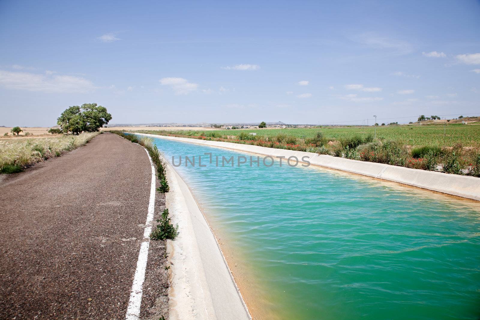 Landscape with road and water channel