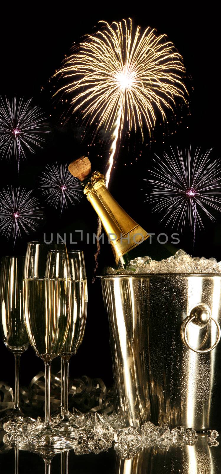 Glasses of champagne with fireworks by Sandralise