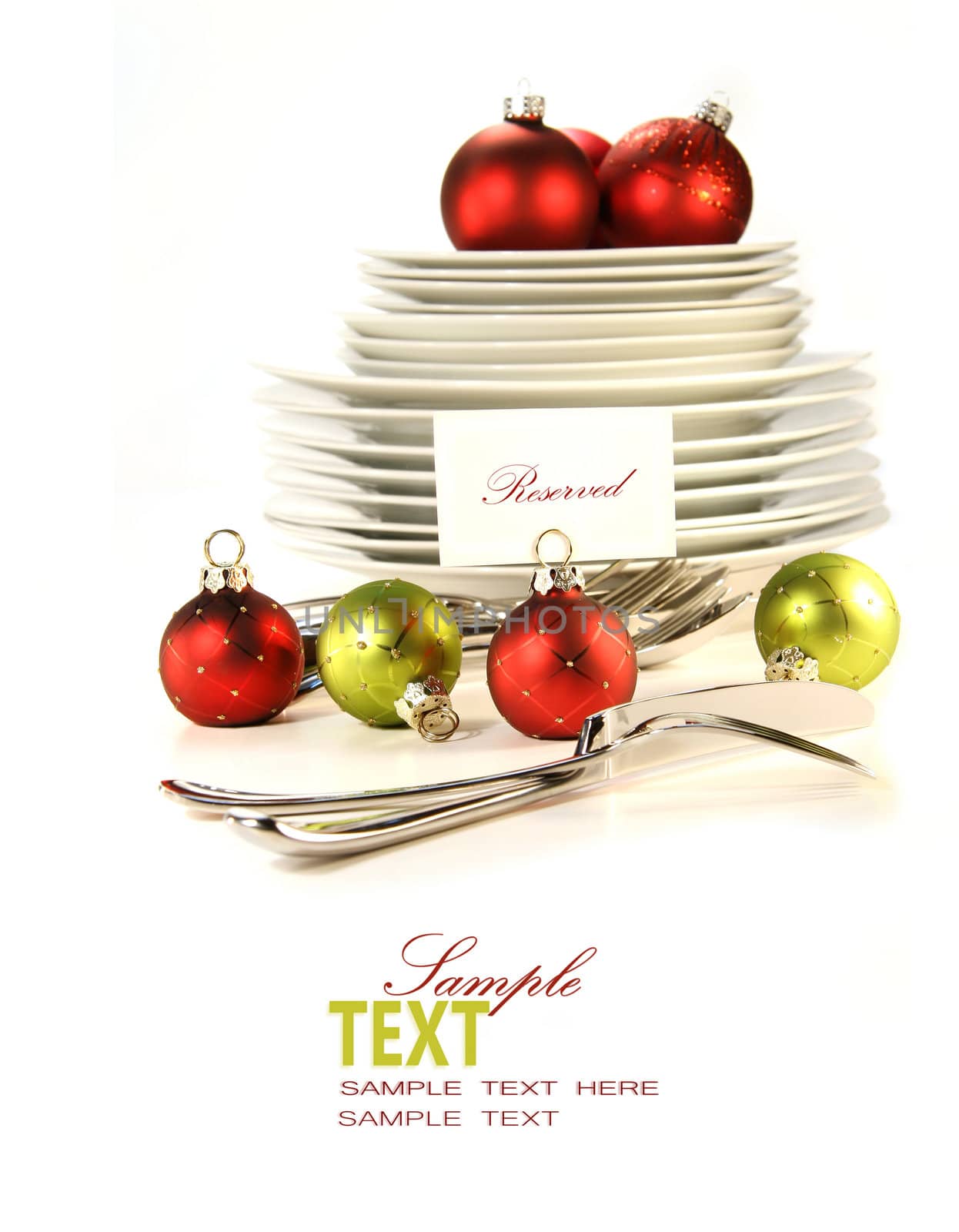 Festive place card holders with plates and cutlery on white background