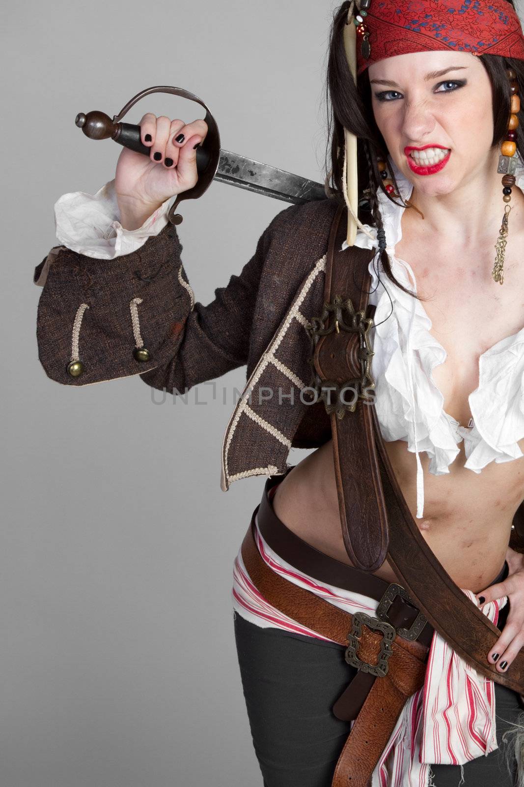 Sexy female pirate holding sword