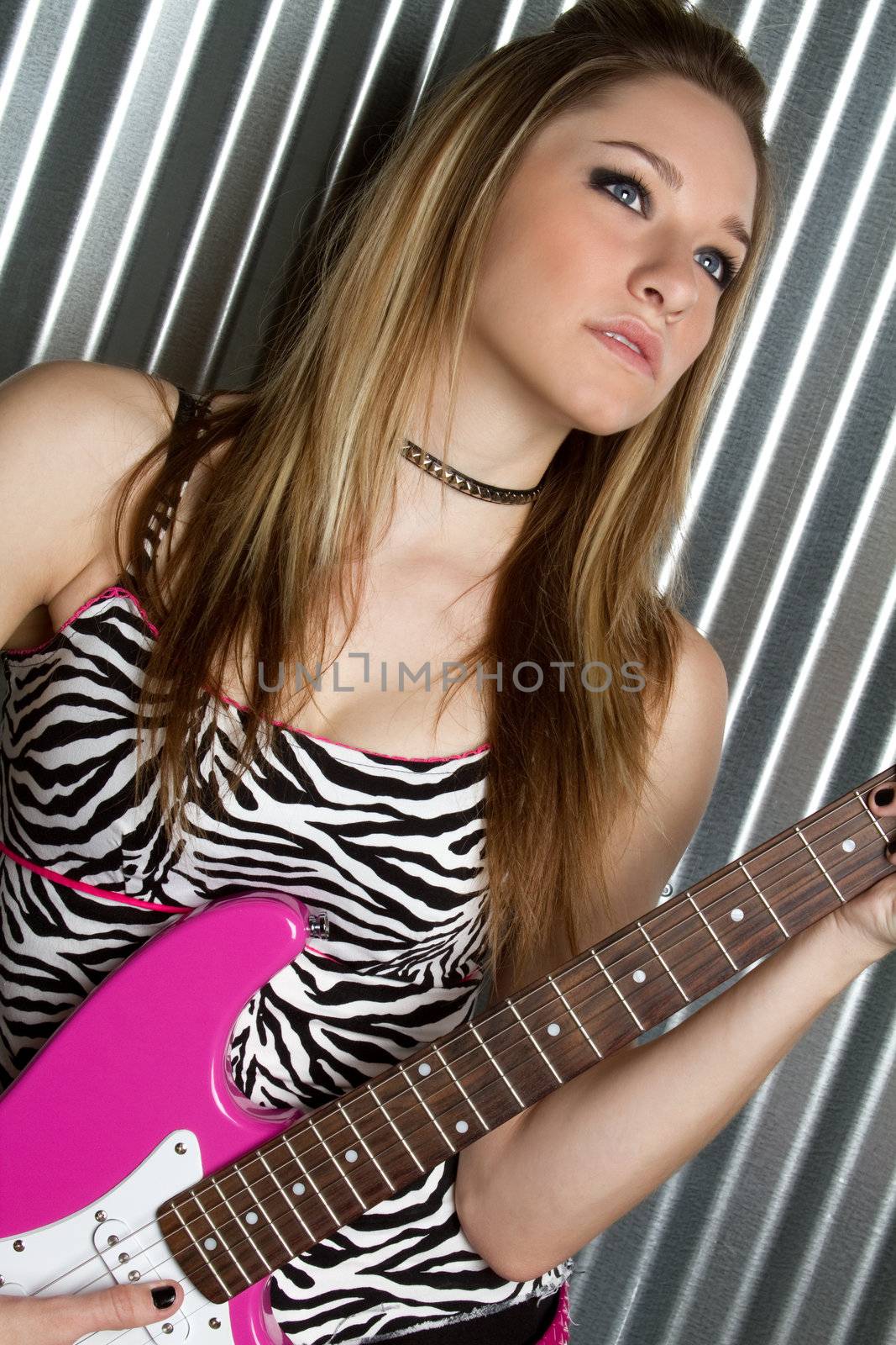 Musician girl holding guitar
