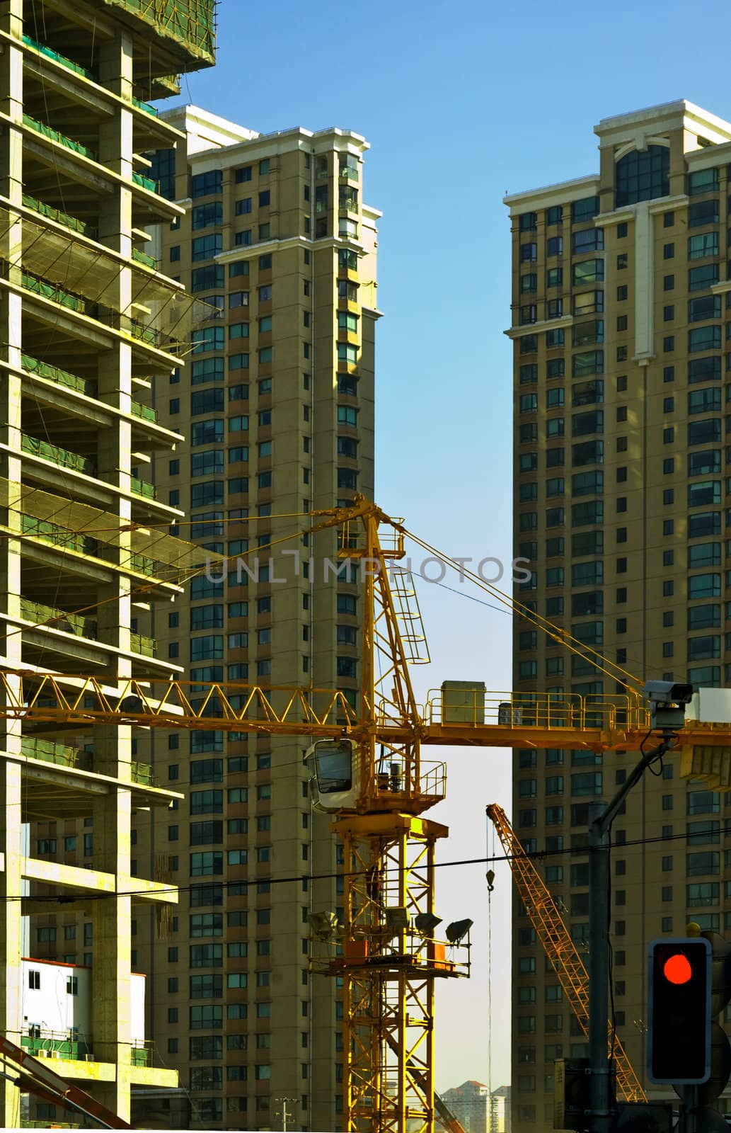 office skyscraper building on construction with big crane