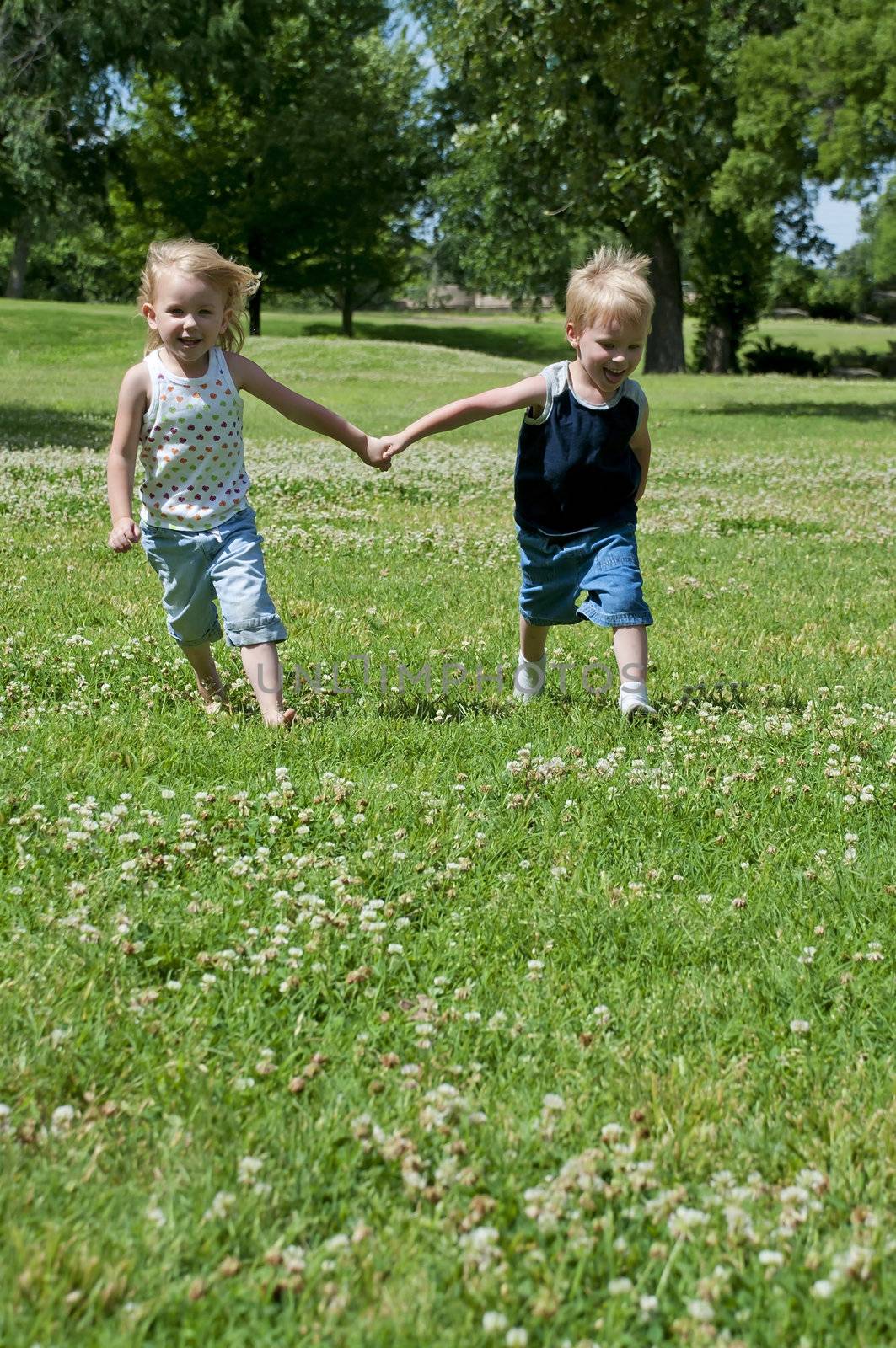 kid play outdoors in the bright sun just having fun