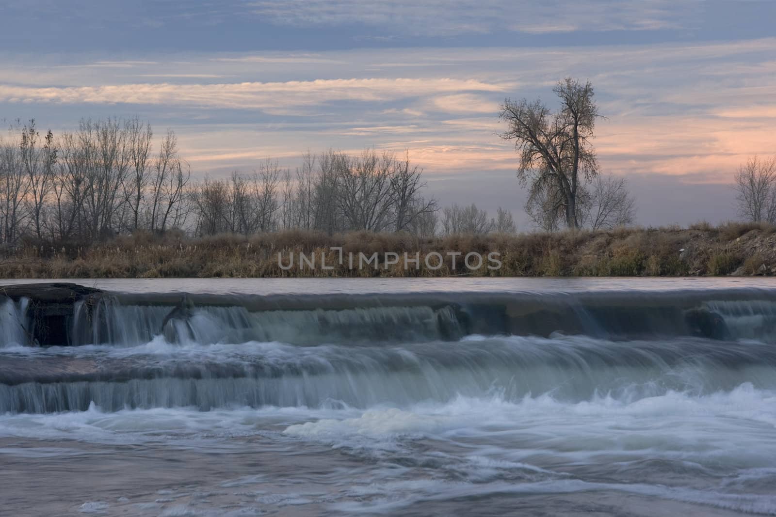 small river diversion dam in north eastern Colorado by PixelsAway