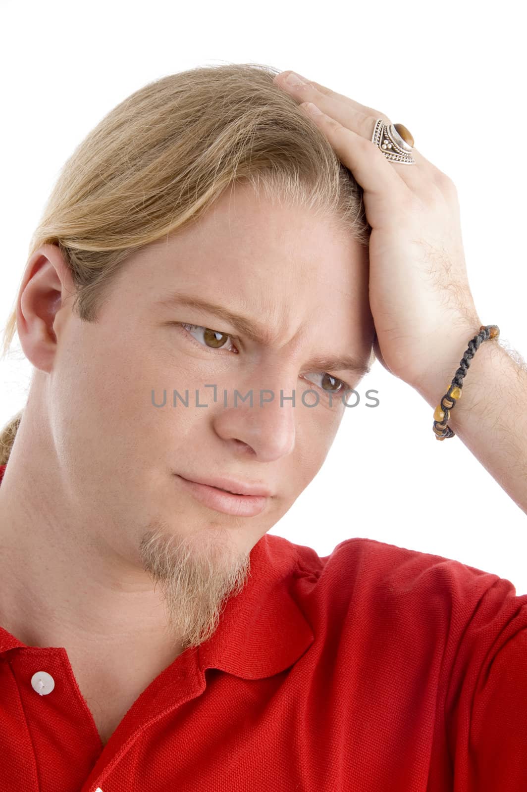 handsome male in tension against white background