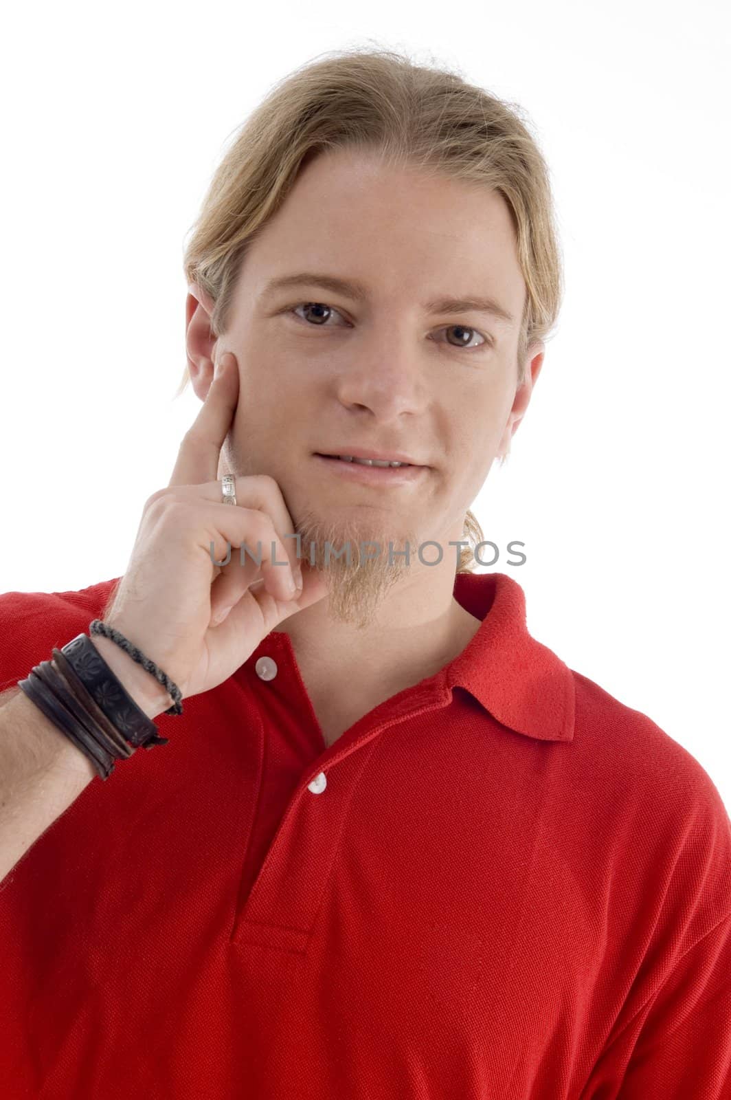 young american male looking at camera  against white background