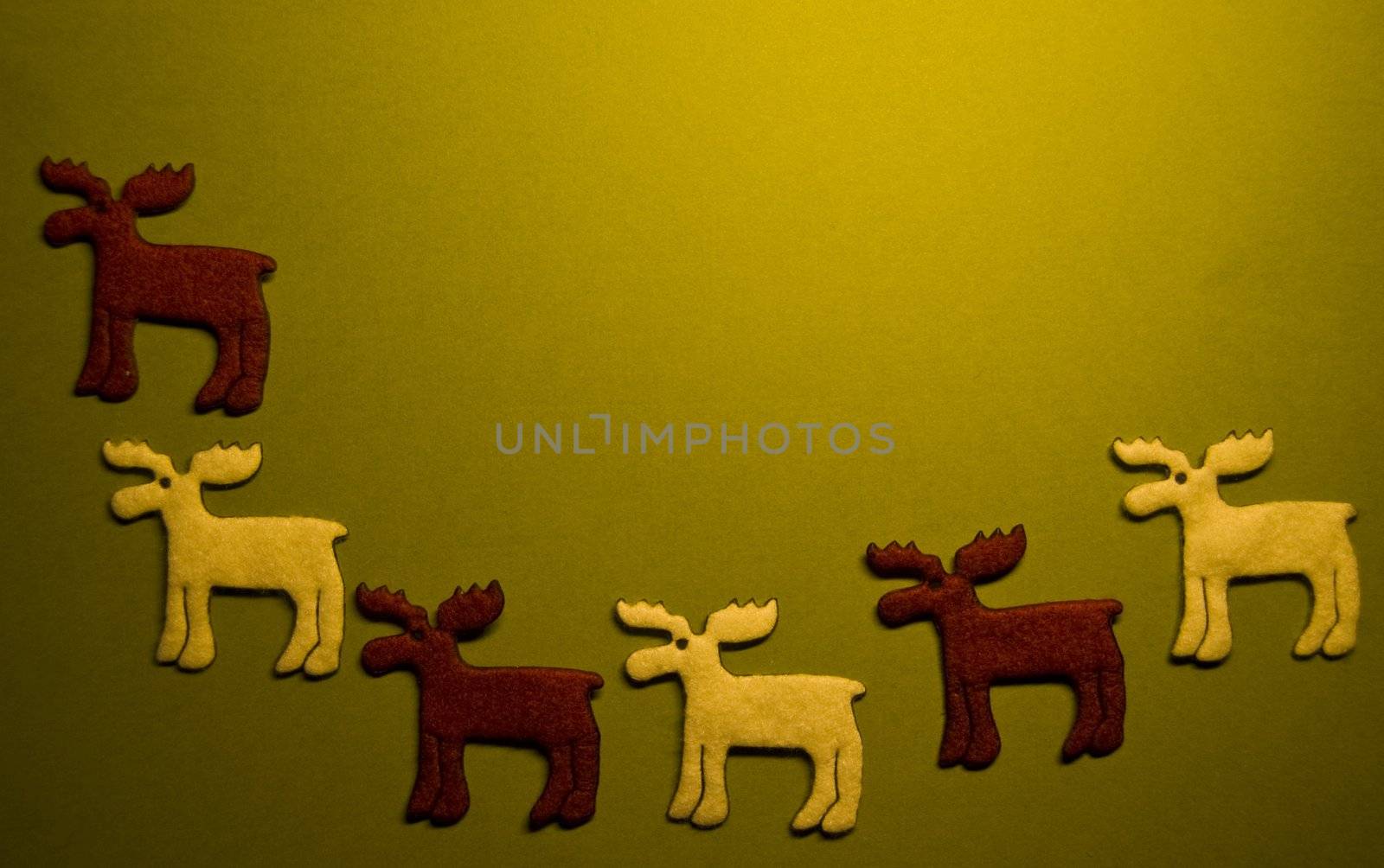 five reindeers on green paper (xmas motif)