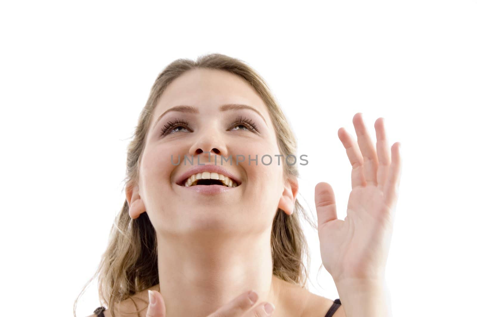 smiling female looking upward on an isolated background