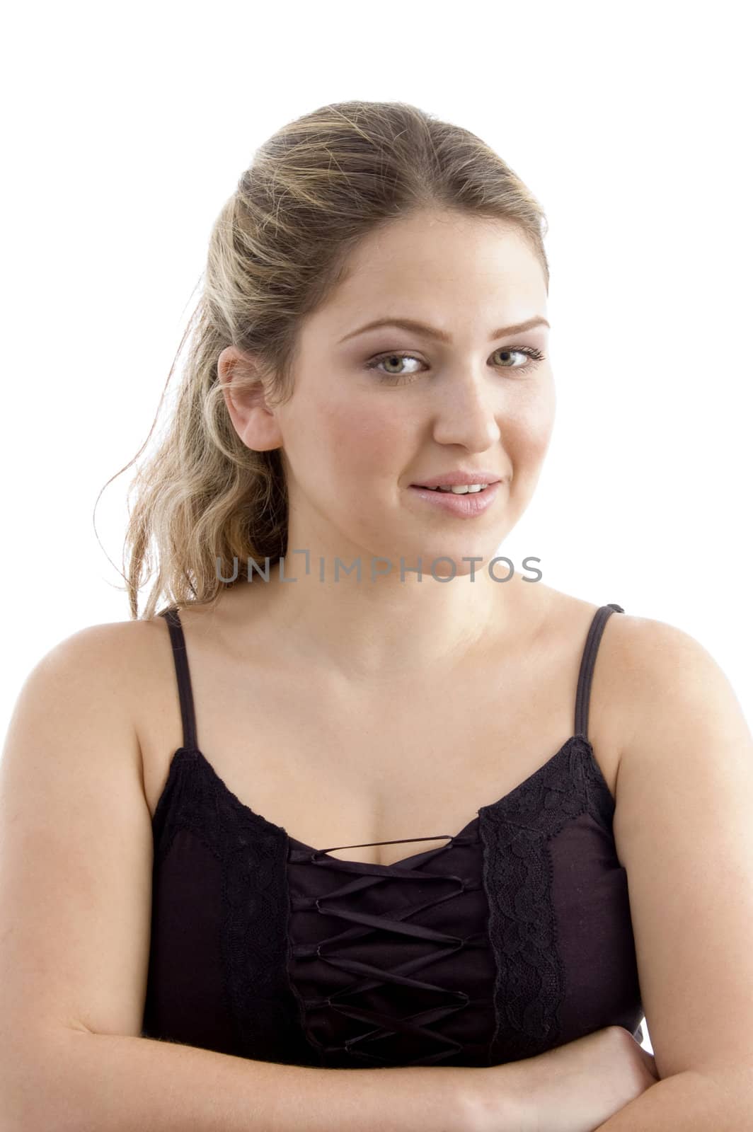 portrait of young woman with folded hands on an isolated background