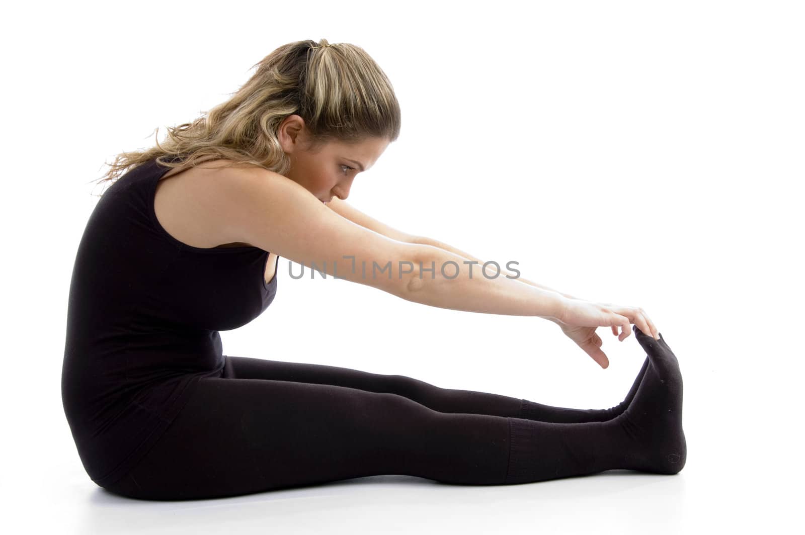 side view of female doing exercise on an isolated white background