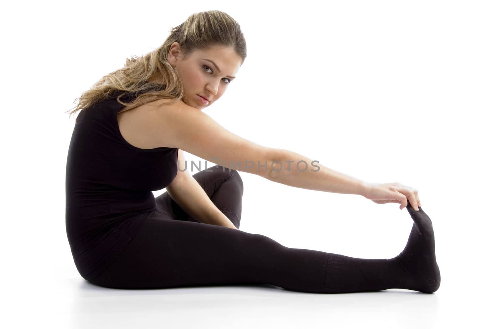 side view of girl doing exercise on an isolated background