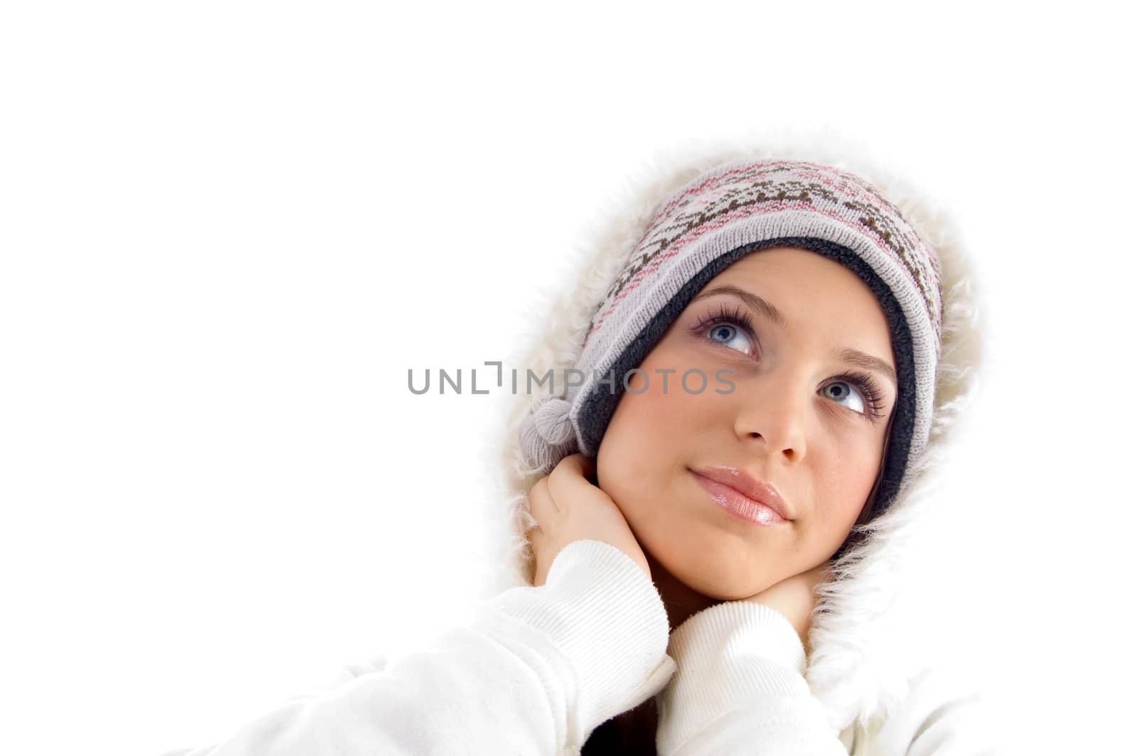 female posing in winter wear against white background