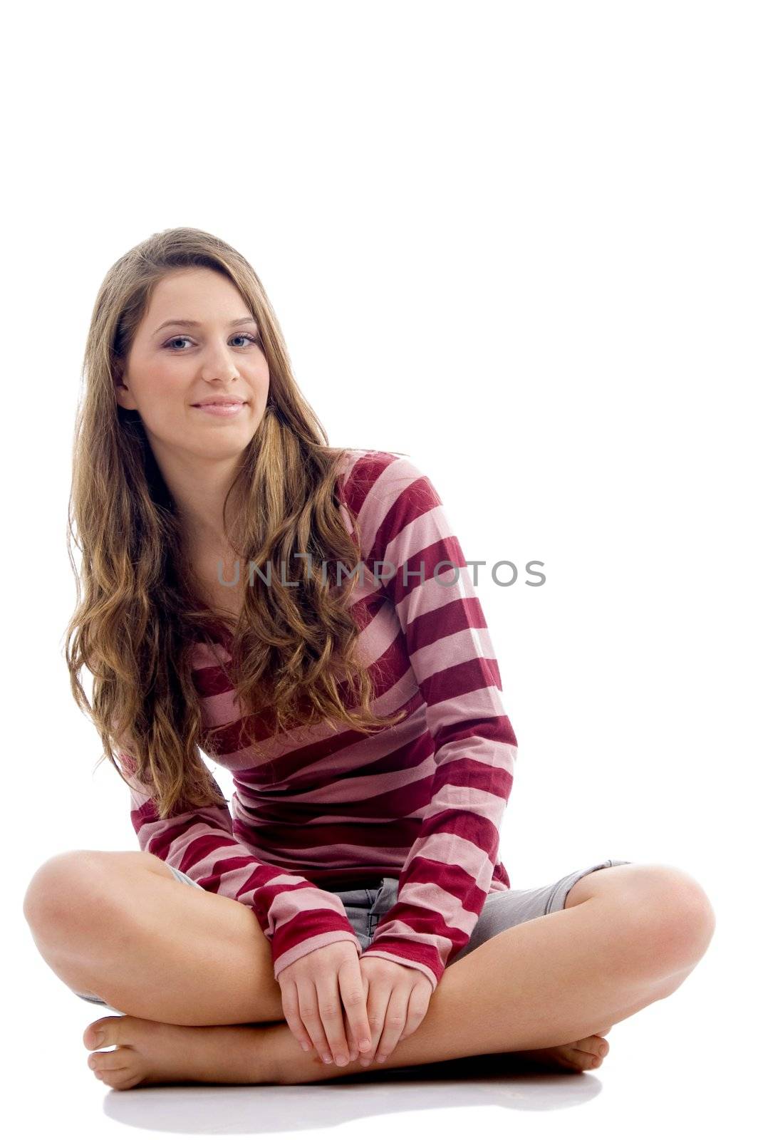 sitting model looking sideways against white background