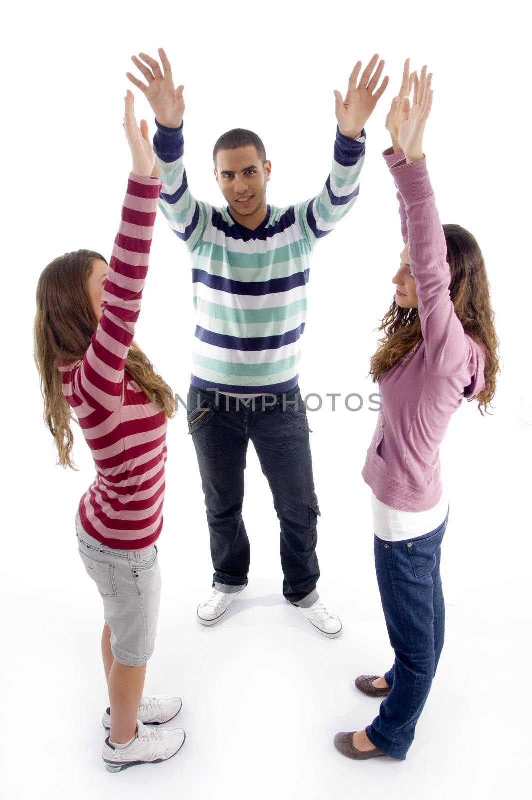 standing friends with raised arms on an isolated background