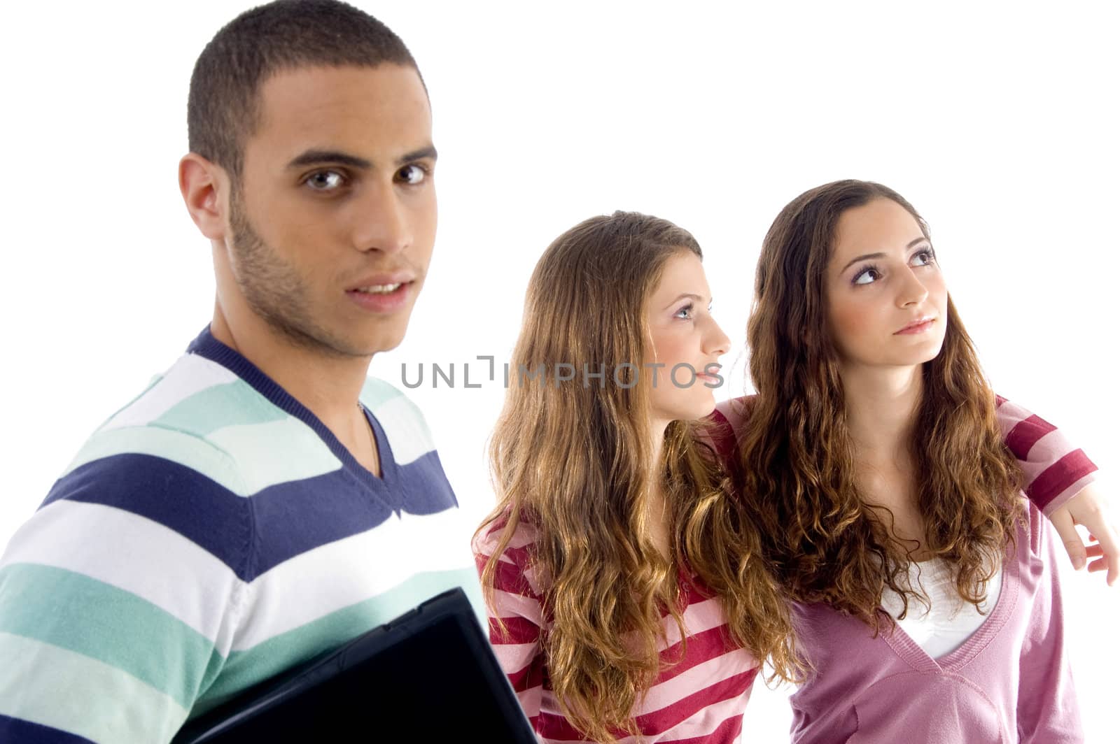 two girls holding each other and guy looking at camera against white background